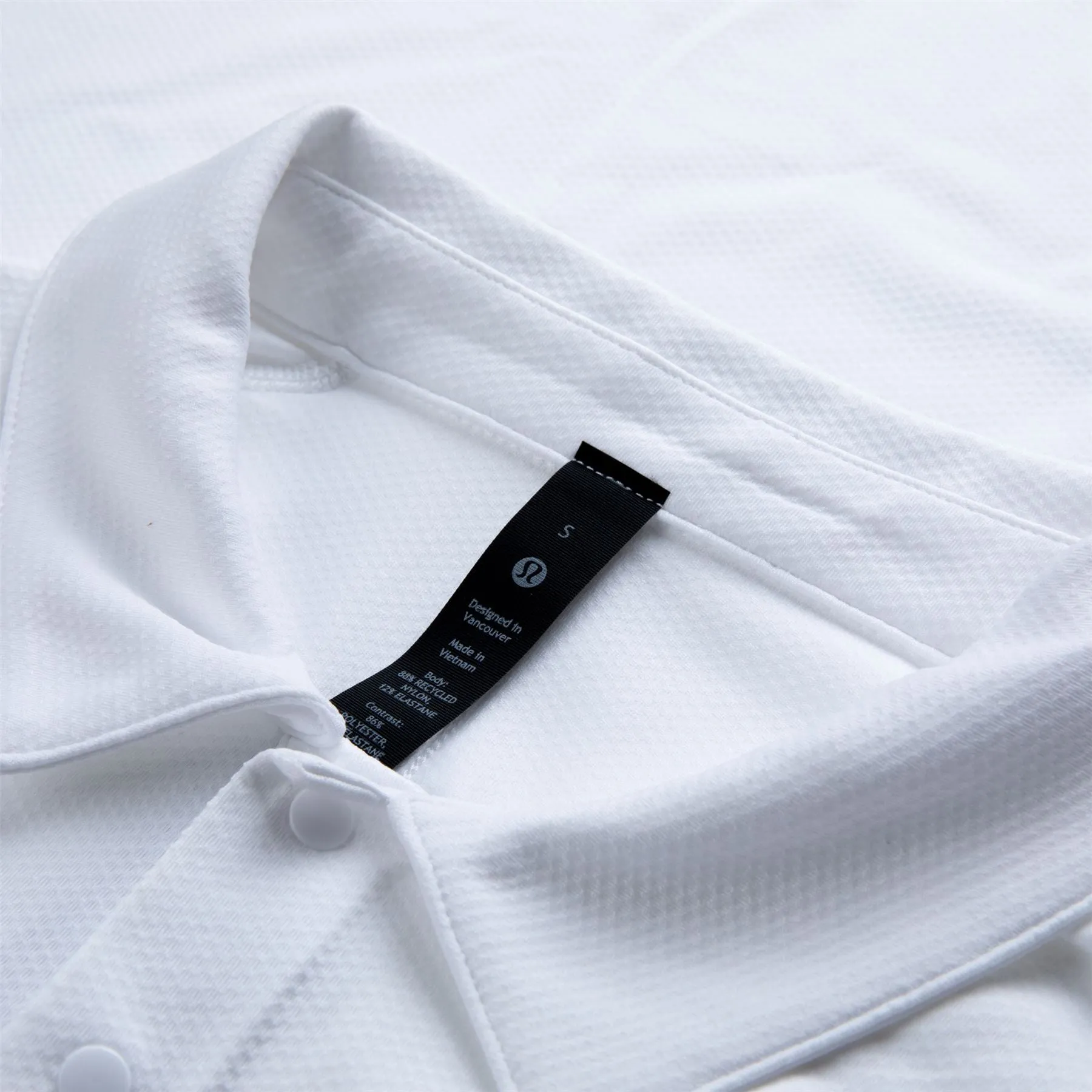 Snap-Front Performance Short- Sleeve Polo White - SS23